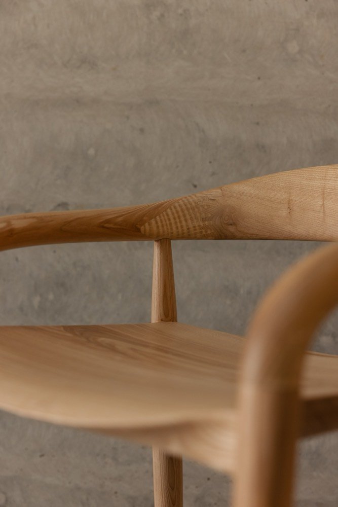 Ash barstool seat and arms seen from above