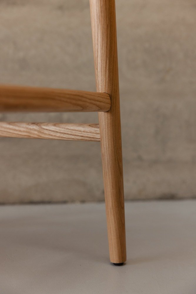 Full ash barstool in raking light