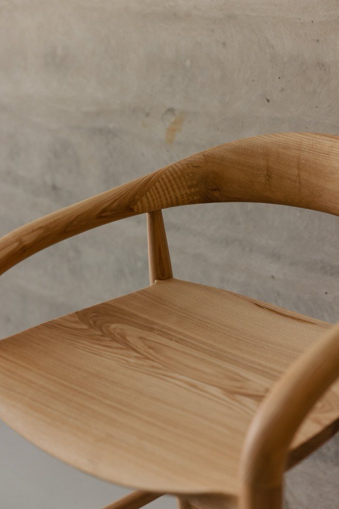 Arm and back detail of the ash barstool